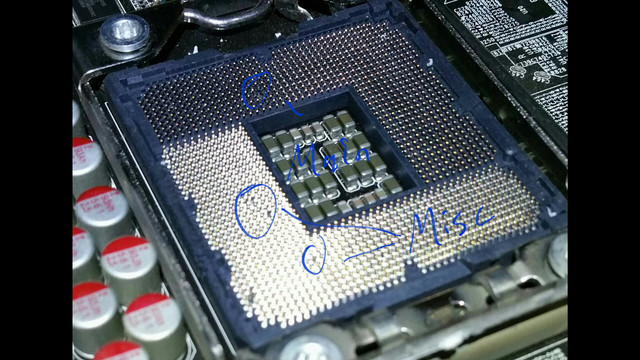 lga 1700 socket has thermal paste and possibly bent pins. is it