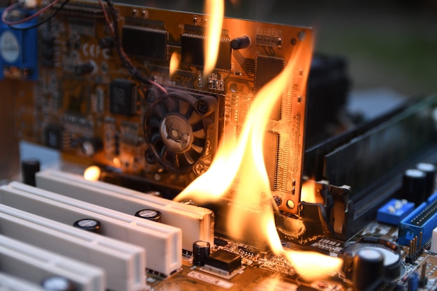 fire-burning-blazing-computer-motherboard-cpu-gpu-video-card-processor-circuit-board-with-electronic_150455-425.jpg