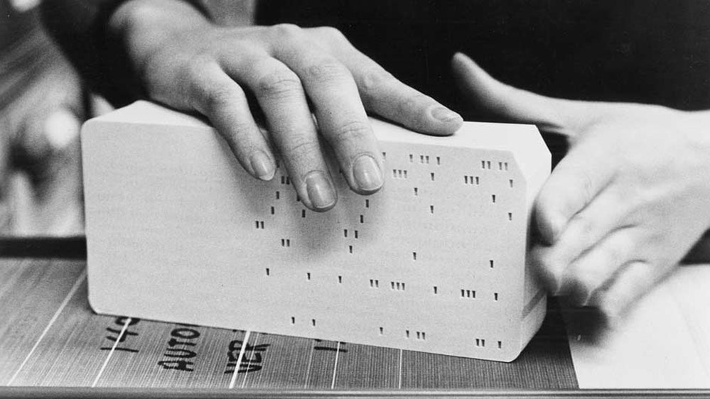 us__en_us__ibm100__punched_card__hand_cards__940x727.jpg